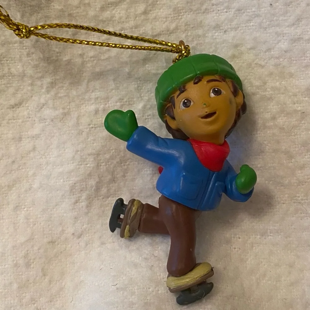 Go Diego and Dora holiday ornament characters with boots, swiped and Santa too!